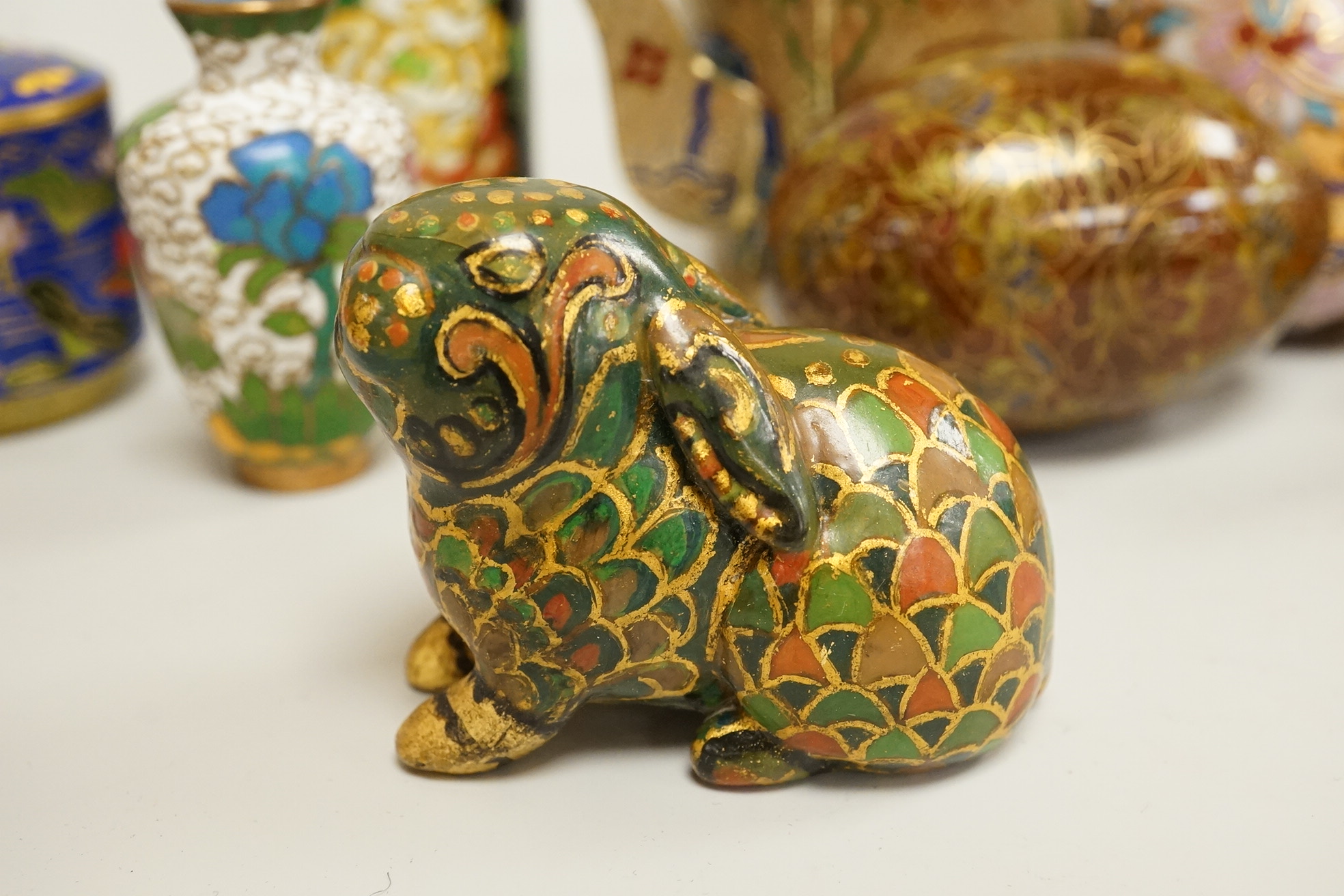 A collection of miniature enamel and cloisonné boxes, eggs and a painted rabbit, etc. (11)